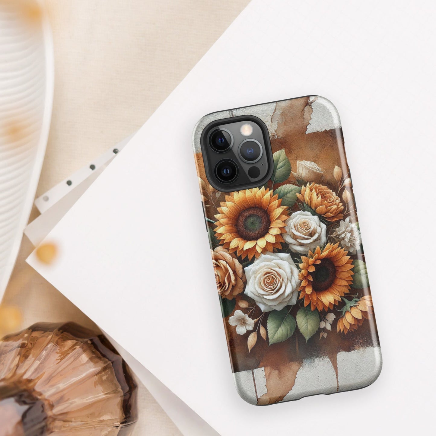 Front of iPhone 12 pro max cover of beige and golden flower arrangement