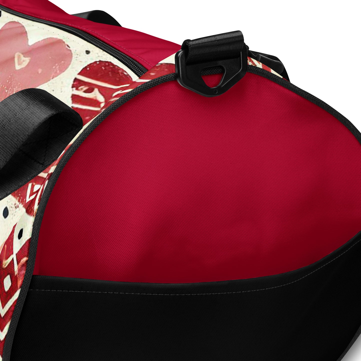 Details of burgundy and pink hearts patterned gym bag