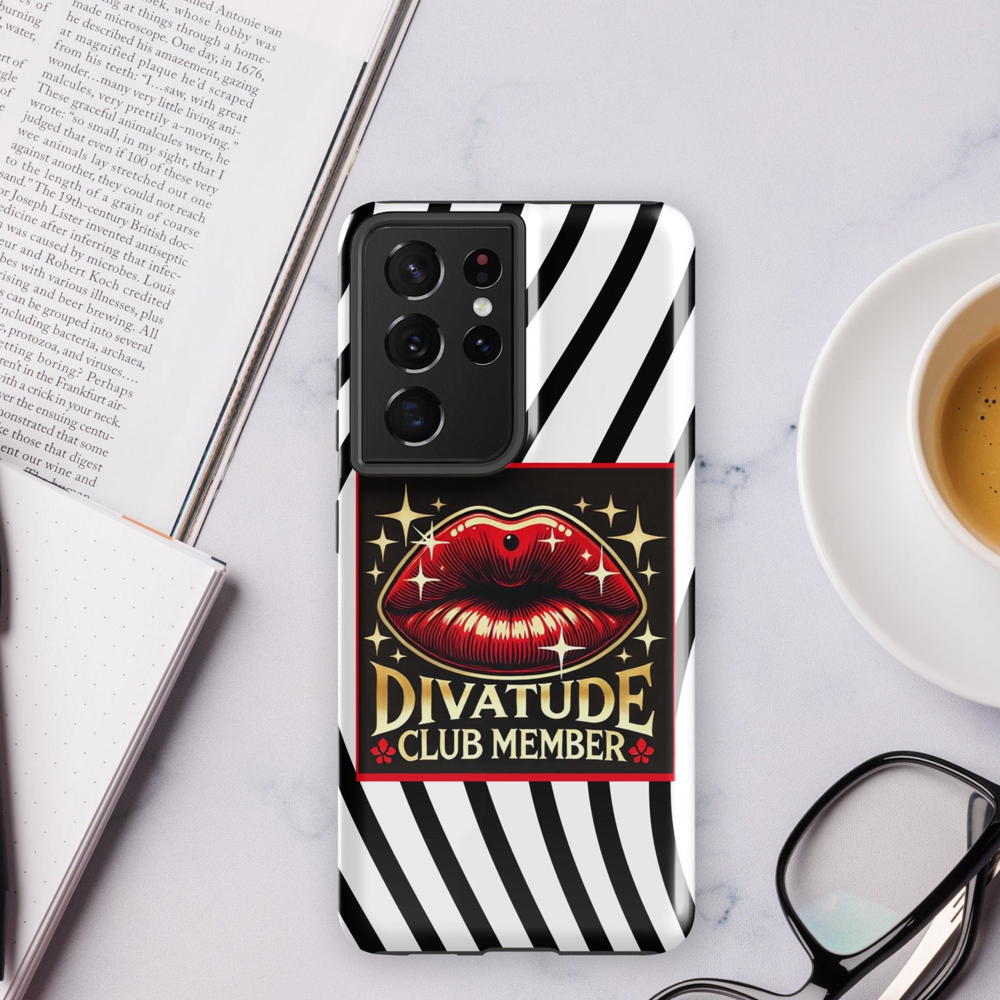 Front of Samsung s21 ultra case with DivaTude icon of red lips and words 'DivaTude Club member' on white background and wavy black lines
