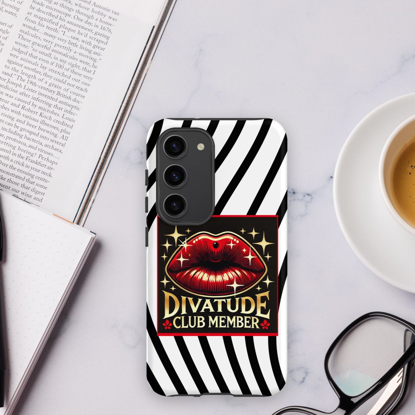 Front of Samsung s23 case with DivaTude icon of red lips and words 'DivaTude Club member' on white background and wavy black lines