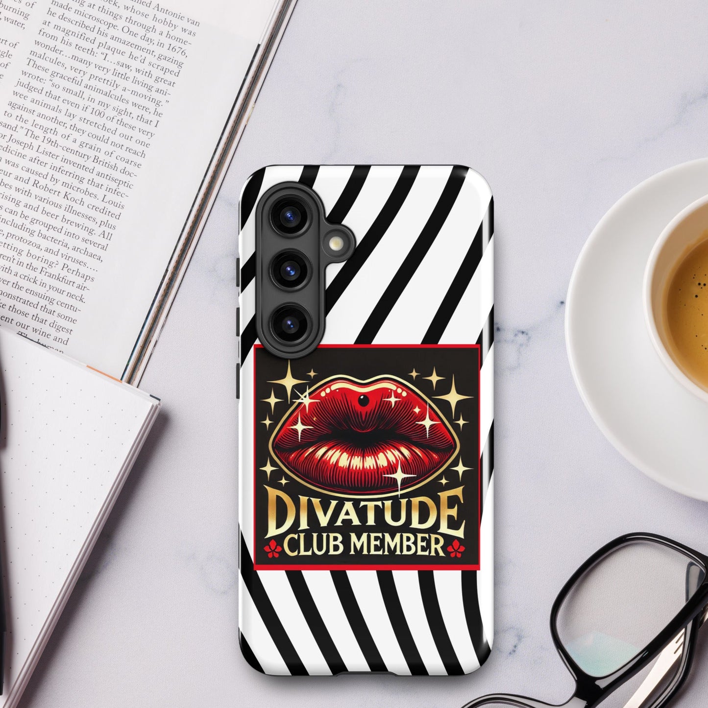 Front of Samsung s24 case with DivaTude icon of red lips and words 'DivaTude Club member' on white background and wavy black lines