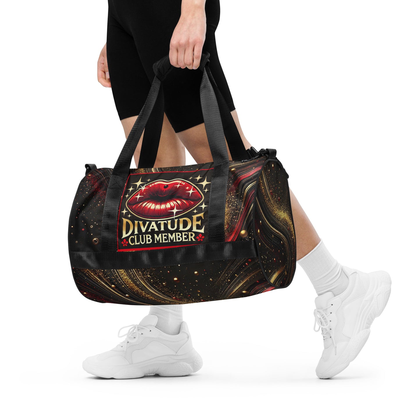 Front of black and gold patterned gym bag with DivaTude icon of red lips and words 'DivaTude Club member'