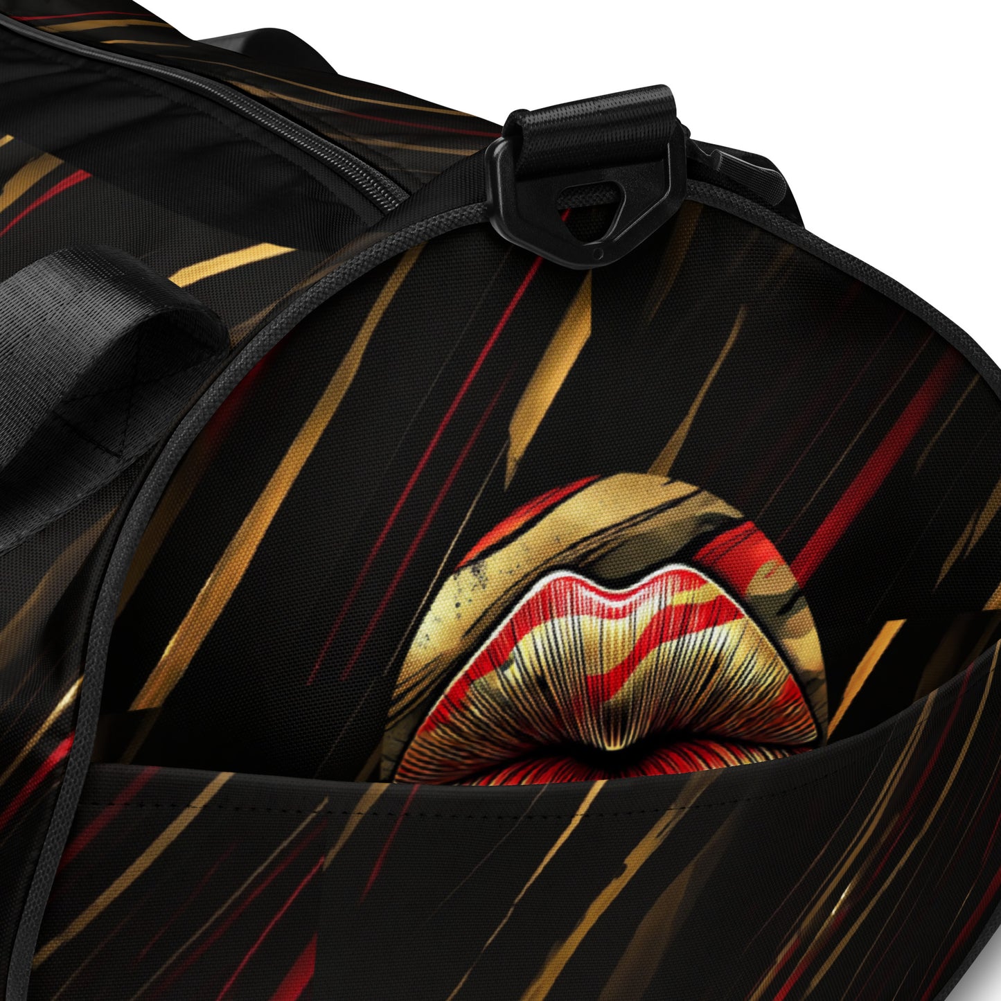 Detailed of a gym bag with icon of gold, black, and red lips on black patterned background