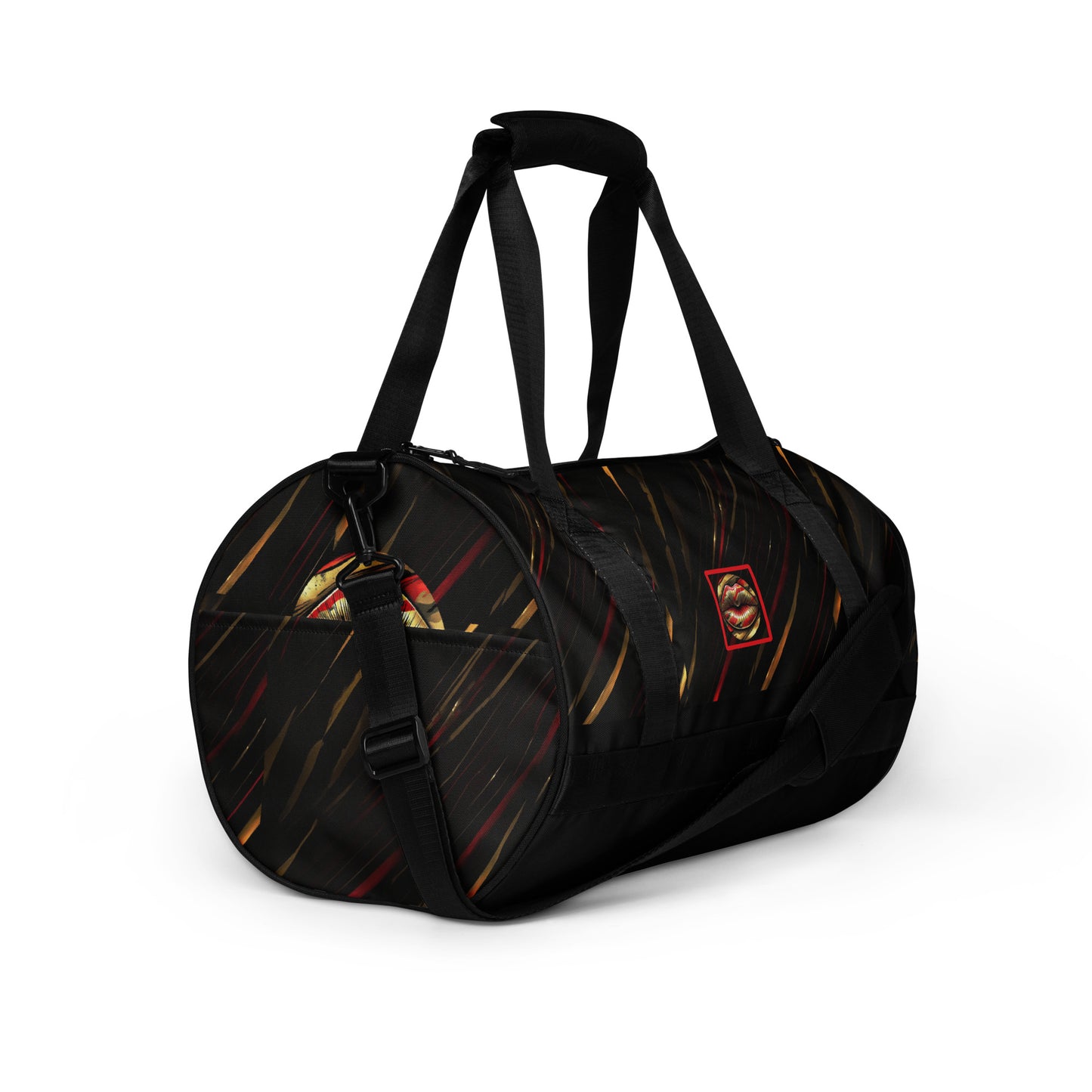 Right front of a gym bag with icon of gold, black, and red lips on black patterned background