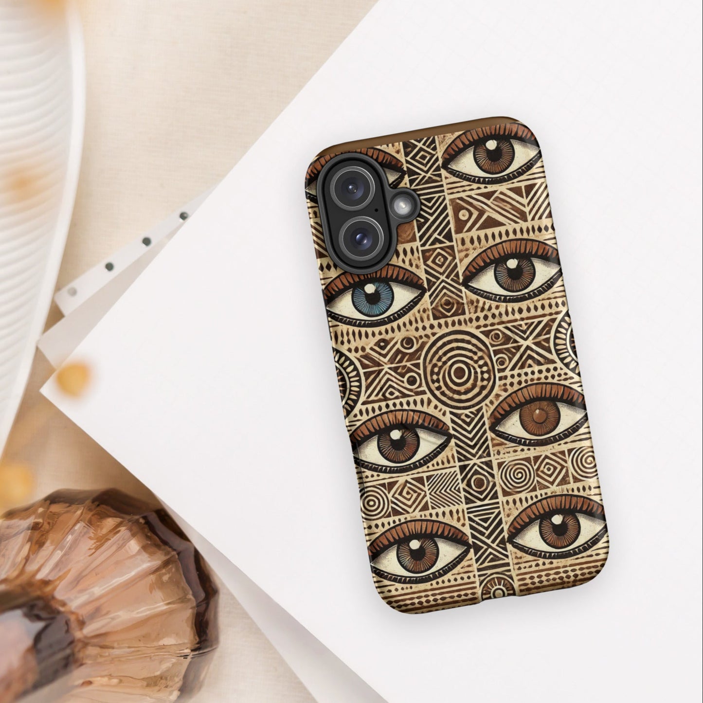 Front of iPhone 14 case with 6eye and shape print pattern