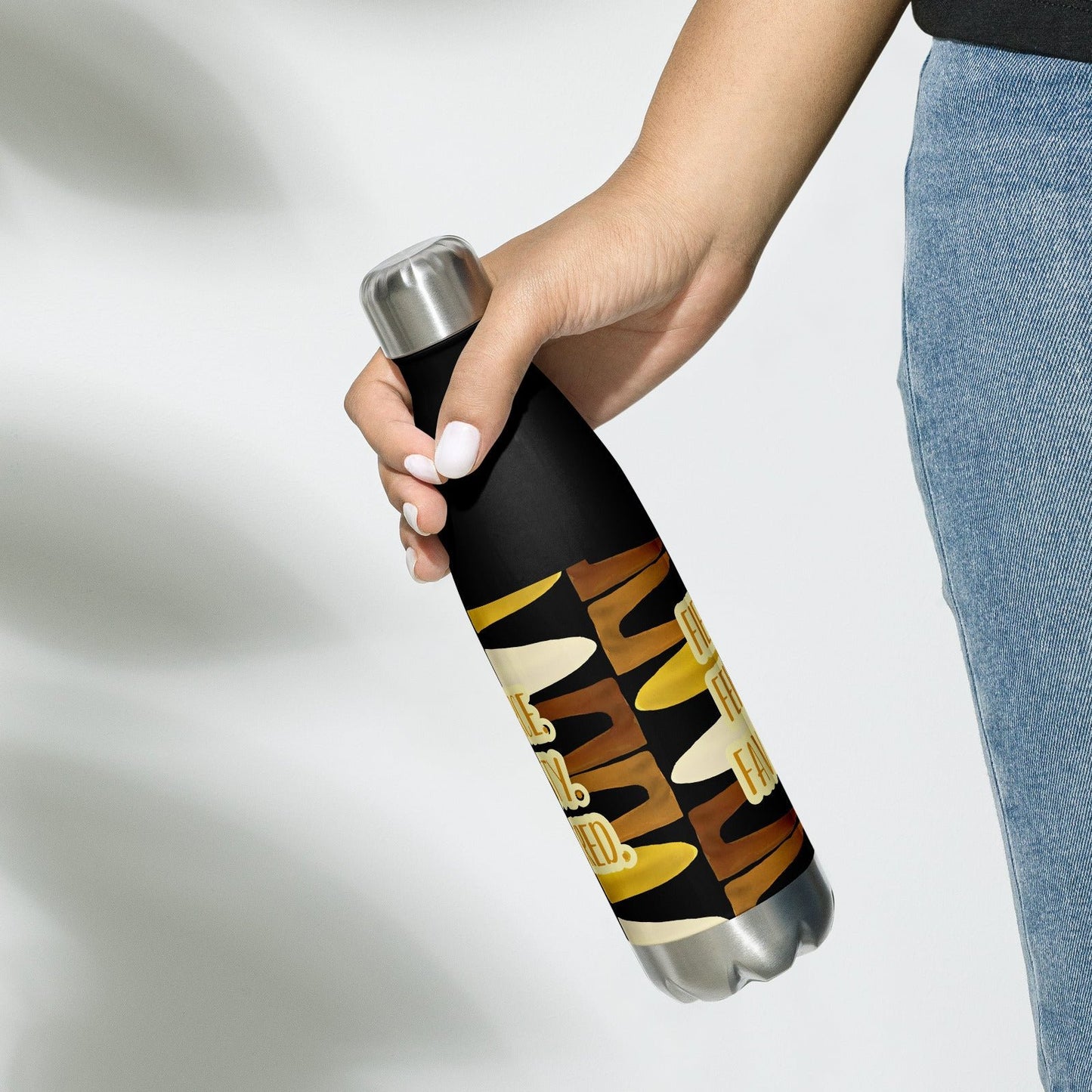 Front of black stainless stee water bottle with brown and gold abstract print