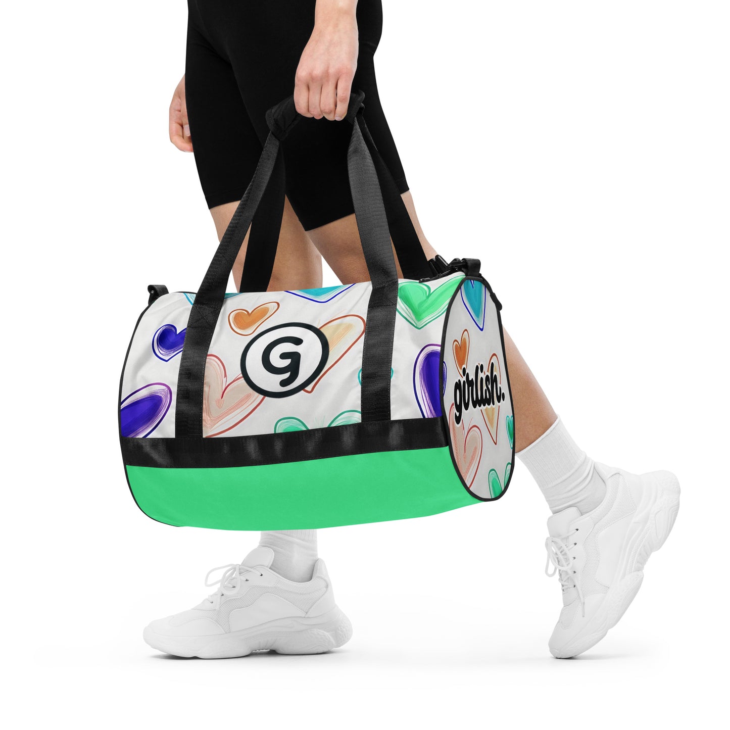 Front of gym back with hearts on white background and Girly logo and 'girlish' text being carried