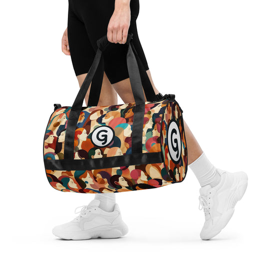 Front of Girlish gym bag with faces background and 'g' symbol and text on side 'girlish.' being carried