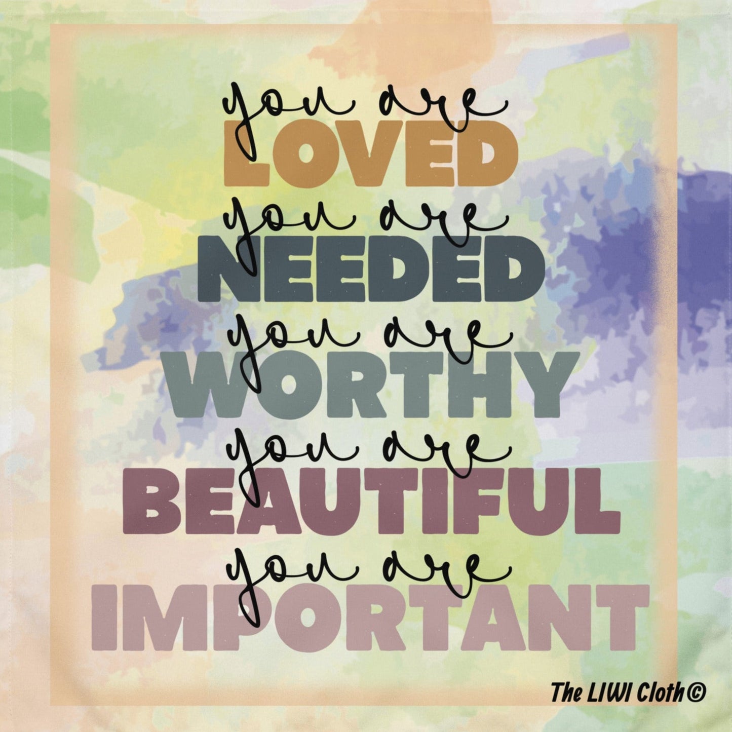 Front of pastel LIWI cloth with multicolored text saying 'you are loved, you are needed, you are worthy, you are beautiful, you are important'