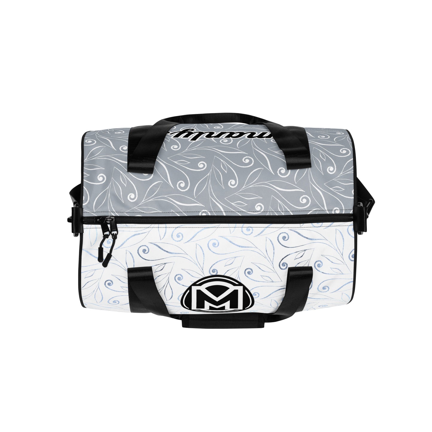 Top of light blue gym bag with blue swirl background and 'M' logo and text 'manly;