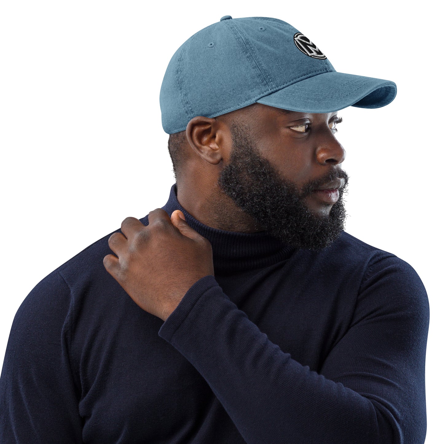 Right of blue cotton hat with manly 'M' embroidered across the front