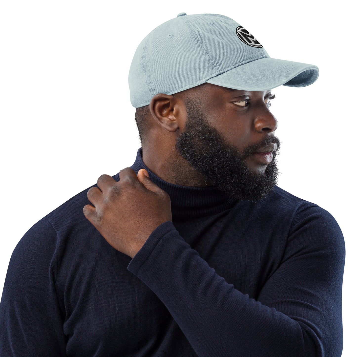 Right of light blue cotton hat with manly 'M' embroidered across the front