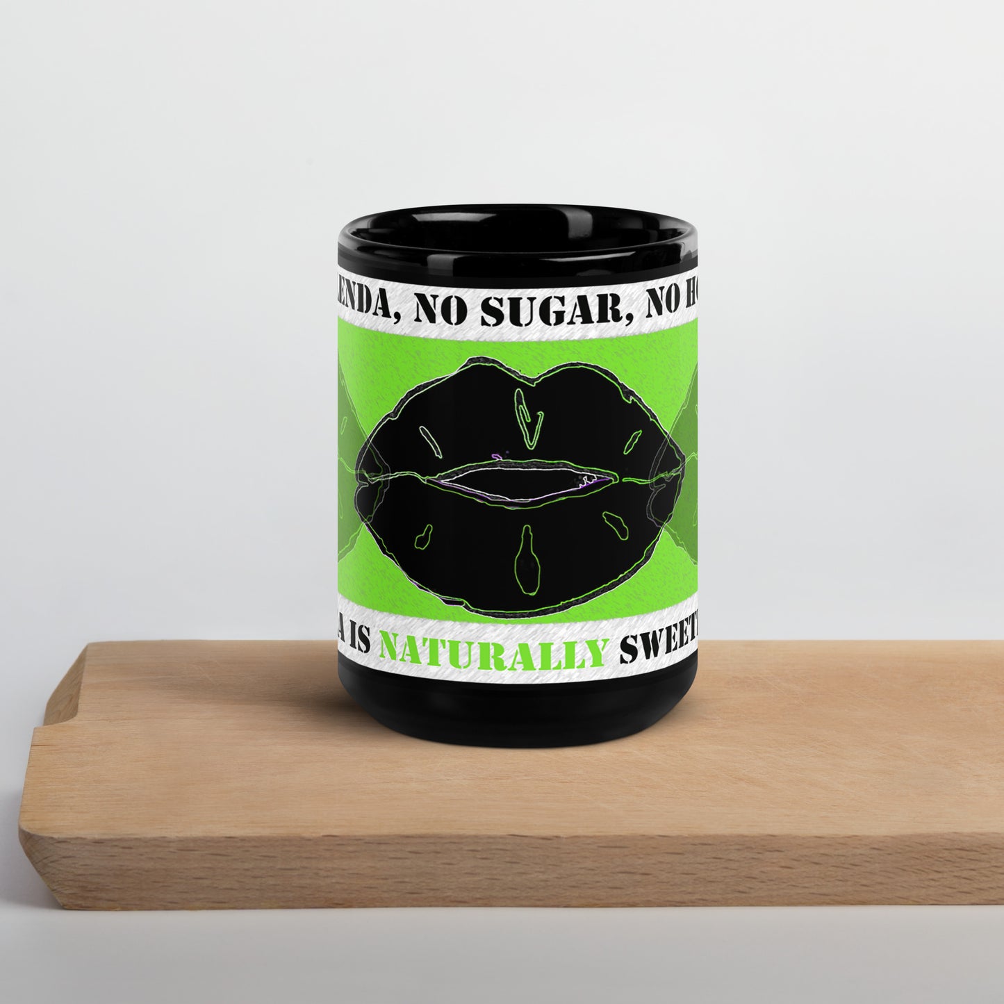 Front view of black mug with green lips and black lips on green and text saying 'no Splenda, no sugar, no honey on top white banner, text saying "my tea is naturally sweetened