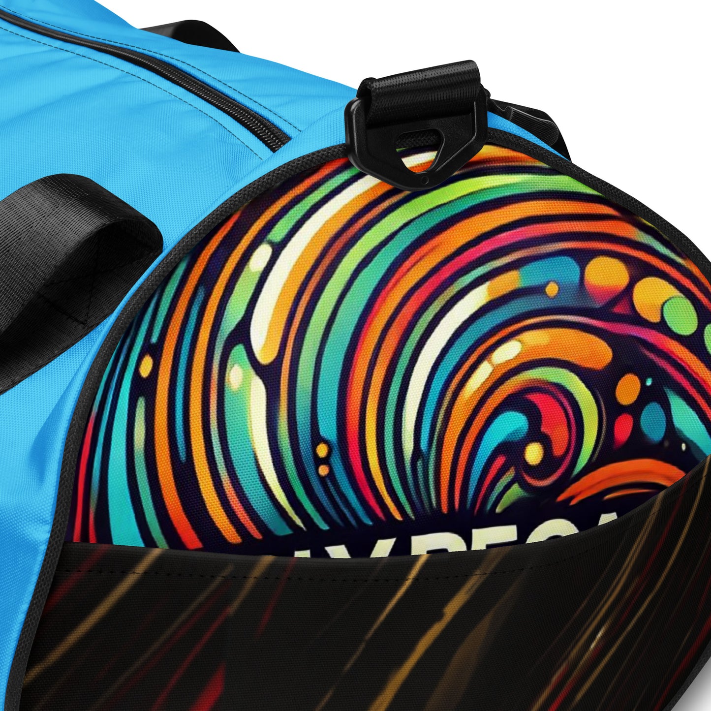 Detail close-up of left front of blue gym bag with 'simply because' multi-colored icons