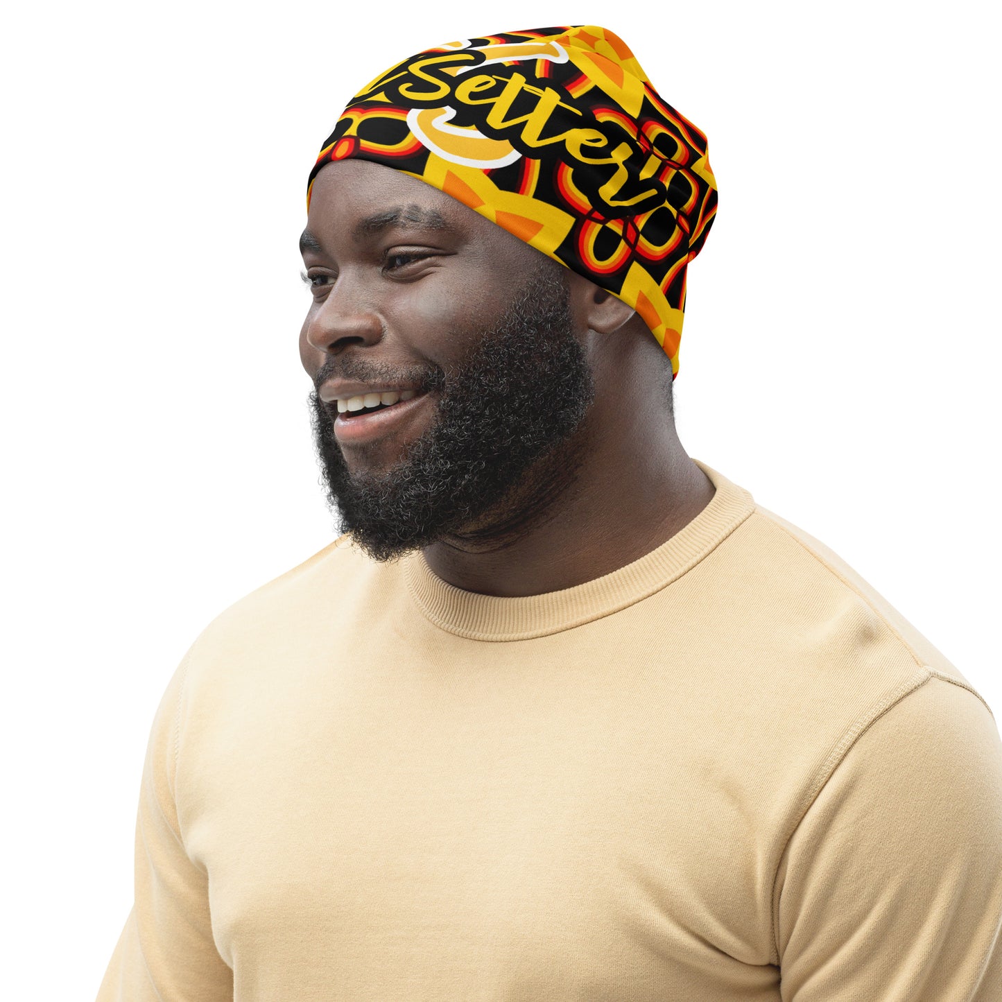 Left front of TrendSetter Exotic beanie with black, red, and gold background with text saying 'TrendSetter'