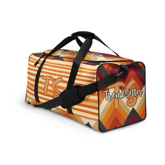 Left front of orange tribal print duffel with text saying 'TS TrendSetter'