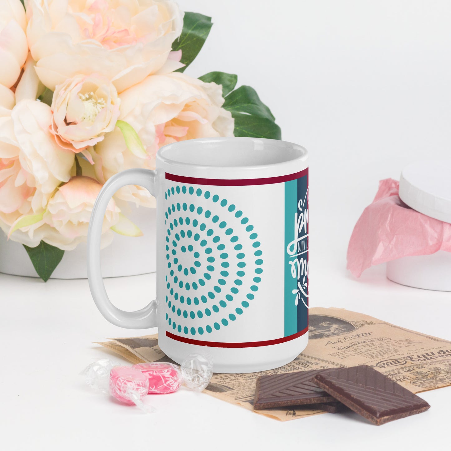 Left of 15 oz white glossy mug with blue swirls background and white text on front saying 'your praise' from Psalm 34