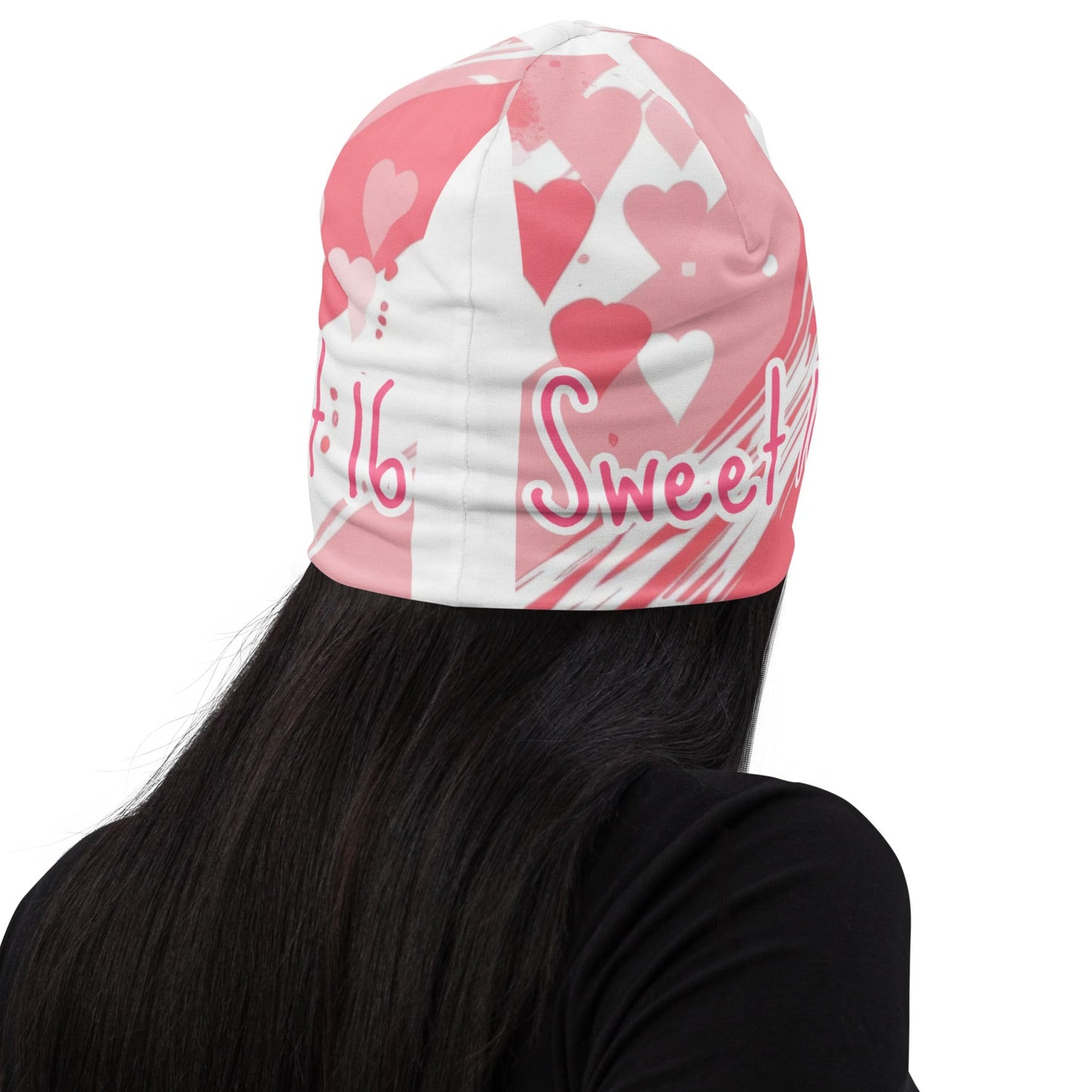 Back of Sweet 16 Youth Beanie with pink and white background and text saying 'Sweet 16'