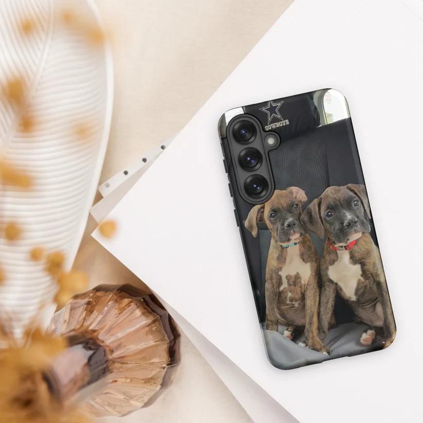 Mobile phone cover with picture of two boxer pupies