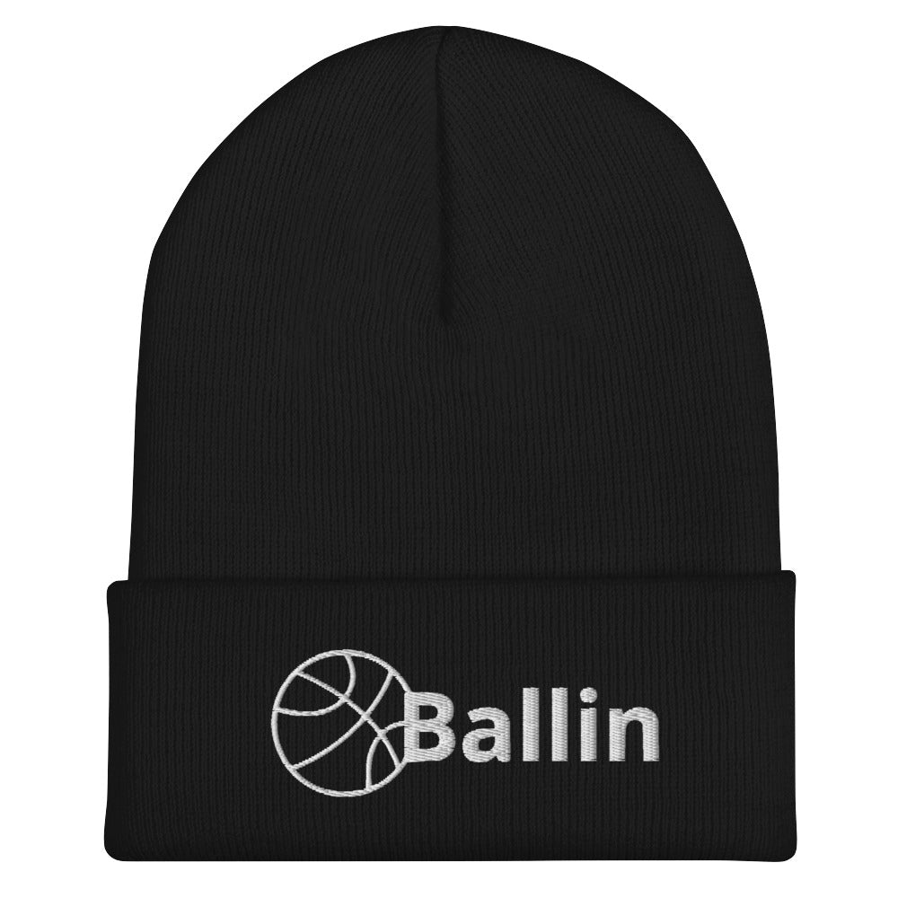 Front of black cuffed beanie with white logo of basketball and word saying 'ballin'