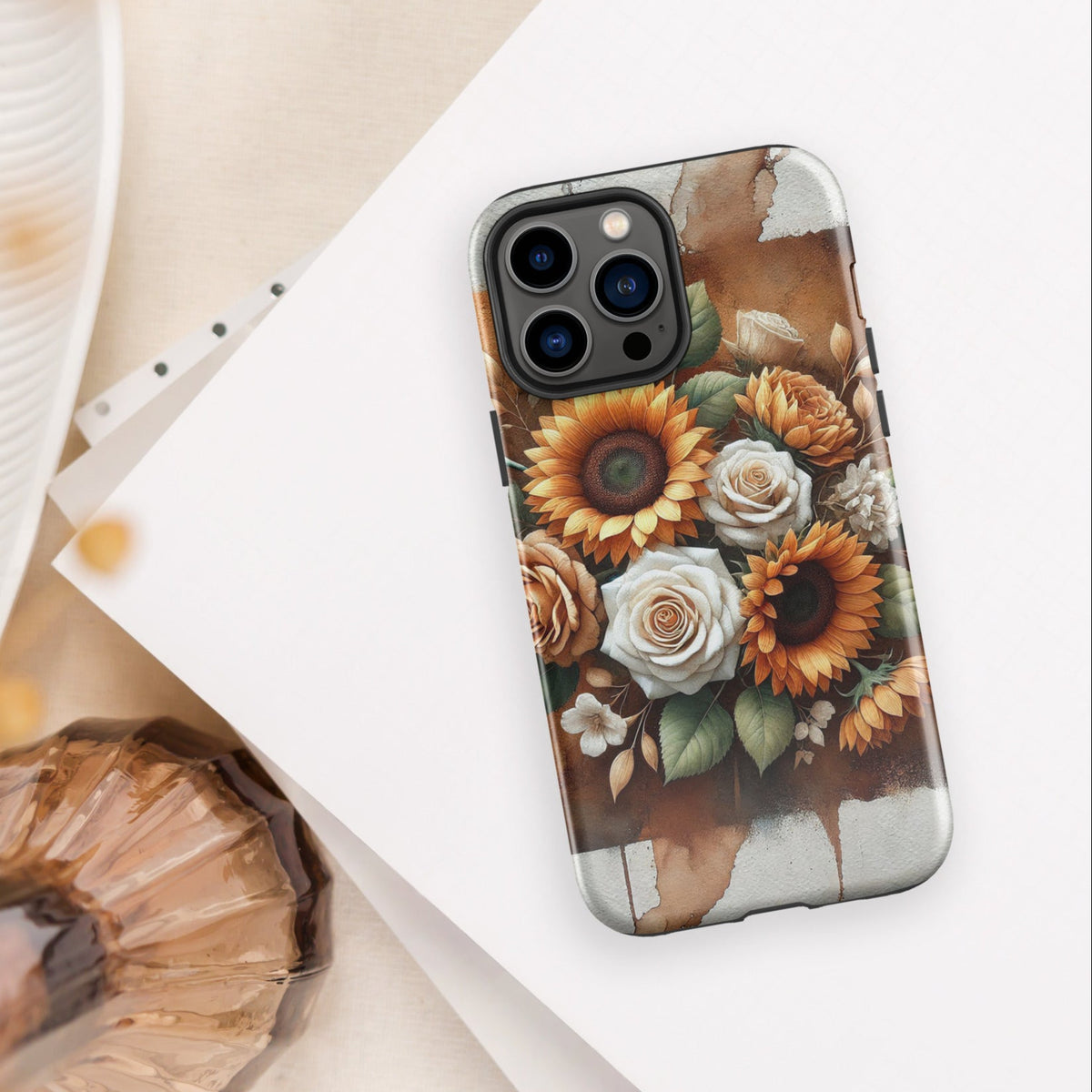 Front of iPhone 13 pro max cover of beige and golden flower arrangement