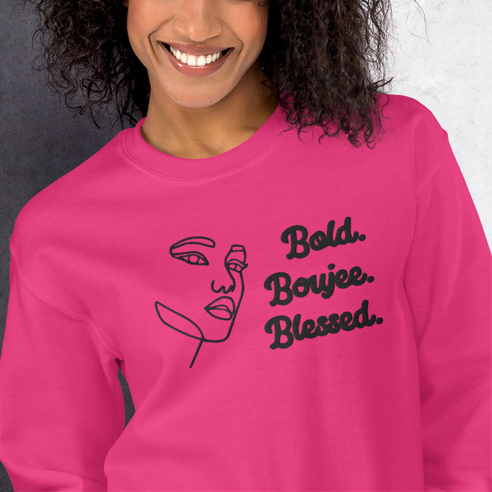 Zoomed heliconia sweatshirt with outline of a woman's face and text saying 'Bold, Boujee, Blessed' in black