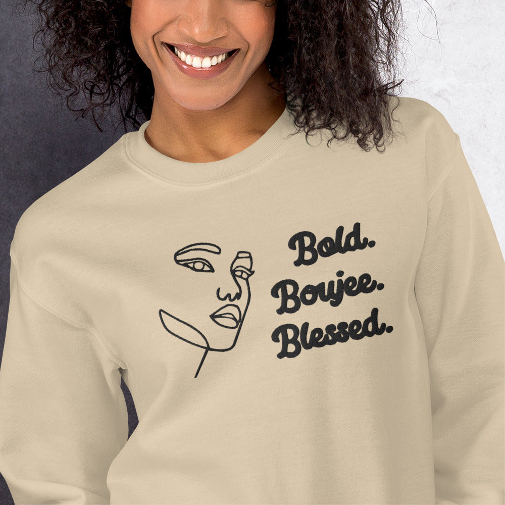 Zoomed sand sweatshirt with outline of a woman's face and text saying 'Bold, Boujee, Blessed' in black