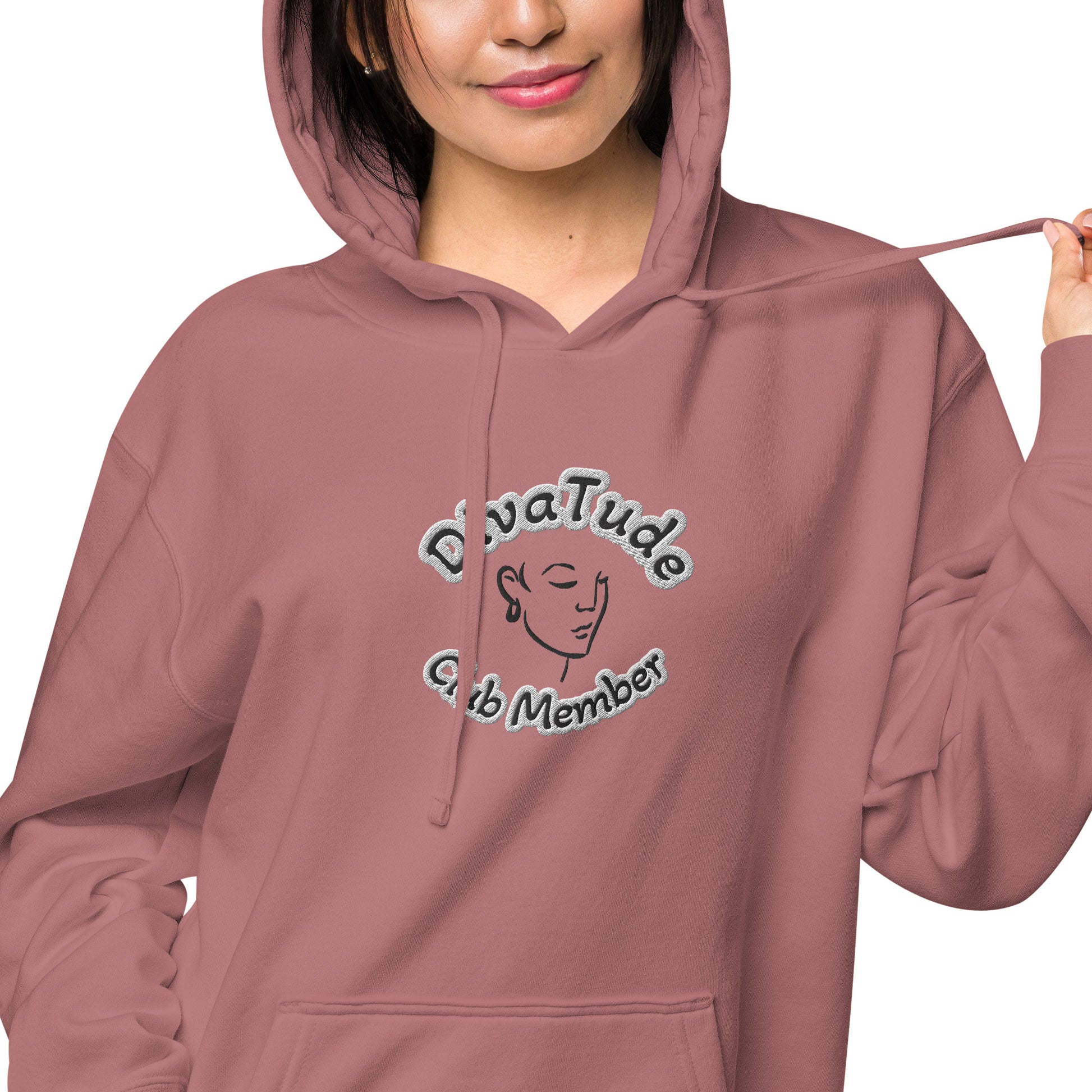 Front of maroon hoodie with embroidered image of woman's face and text reading 'DivaTude' above and 'Club Member