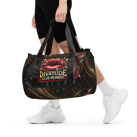 Front of black and gold patterned gym bag with DivaTude icon of red lips and words 'DivaTude Club member'