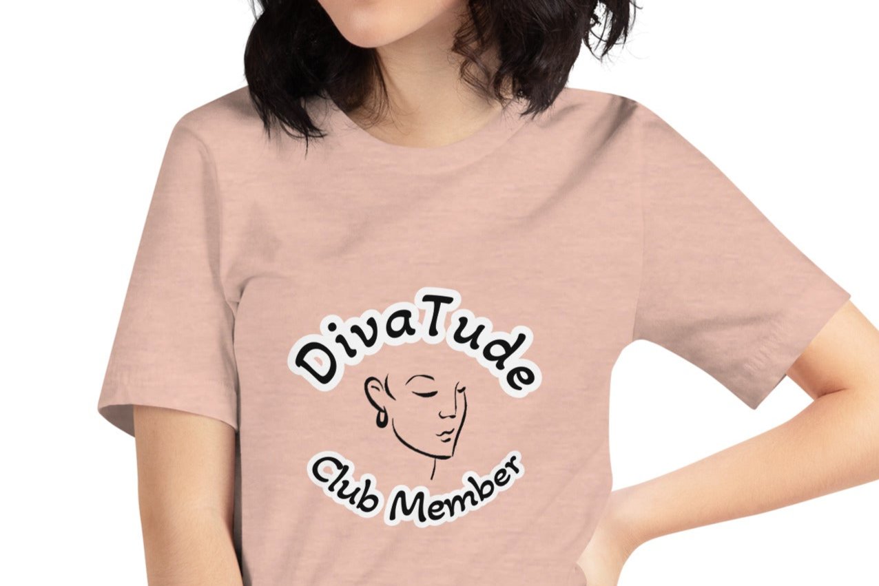 Front of peach women's tshirt with image of lady's face in black with white and black text saying "DivaTude' above and 'Club Member' below 