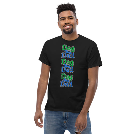 Front of black t-shirt with green and blue text saying 'Dog Dad' three times in vertical layout