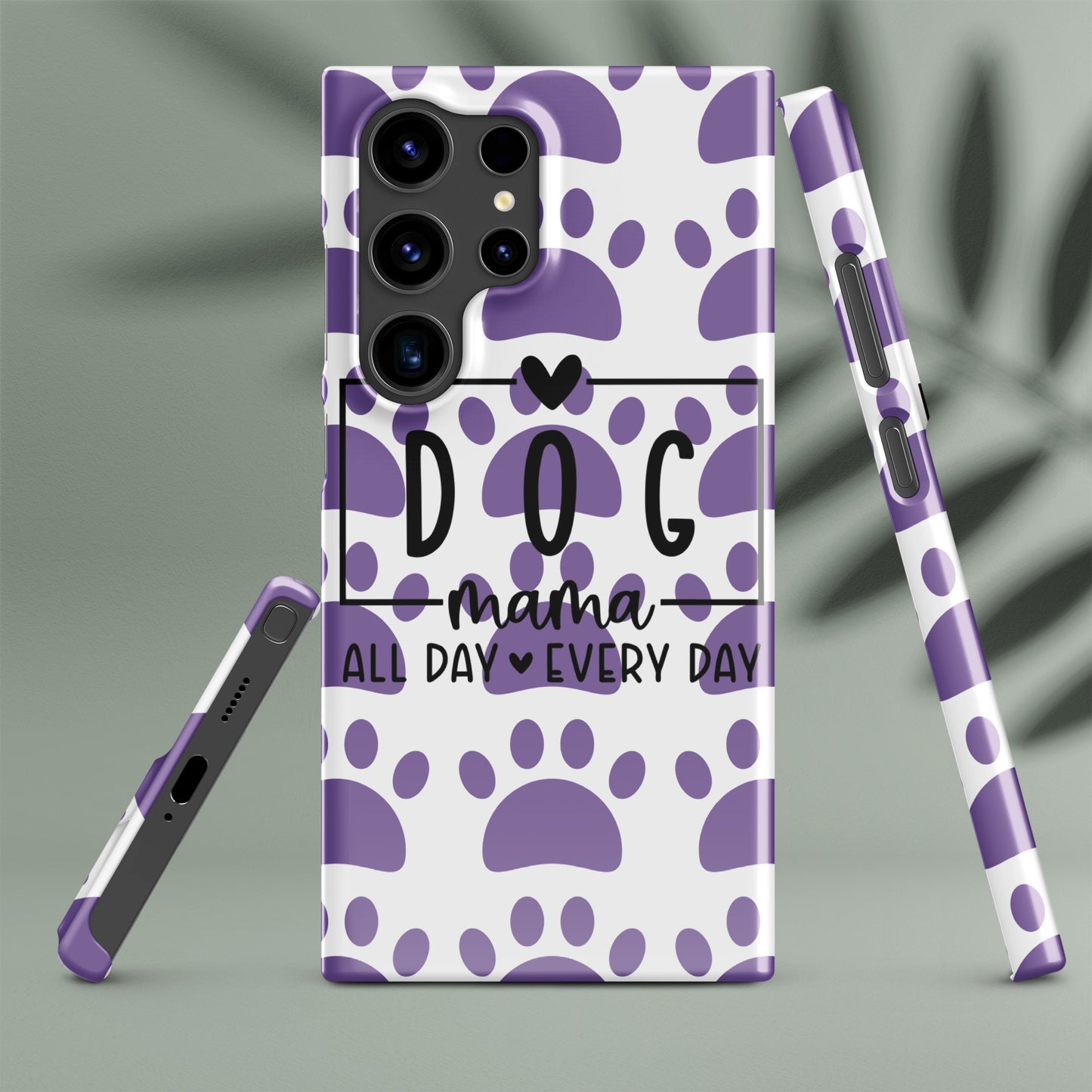 Front of Samsung snap case with a white and purple paw background and black text saying 'Dog Mama All Day Every Day'