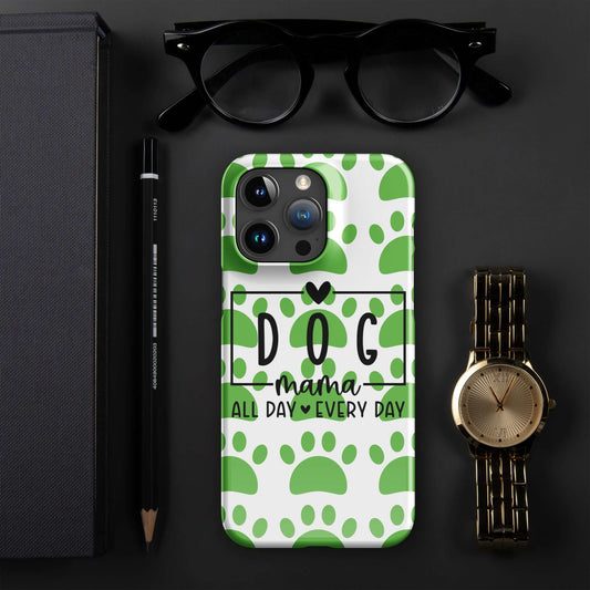 Front of iPhone snap case with a white and green paw background and black text saying 'Dog Mama All Day Every Day'