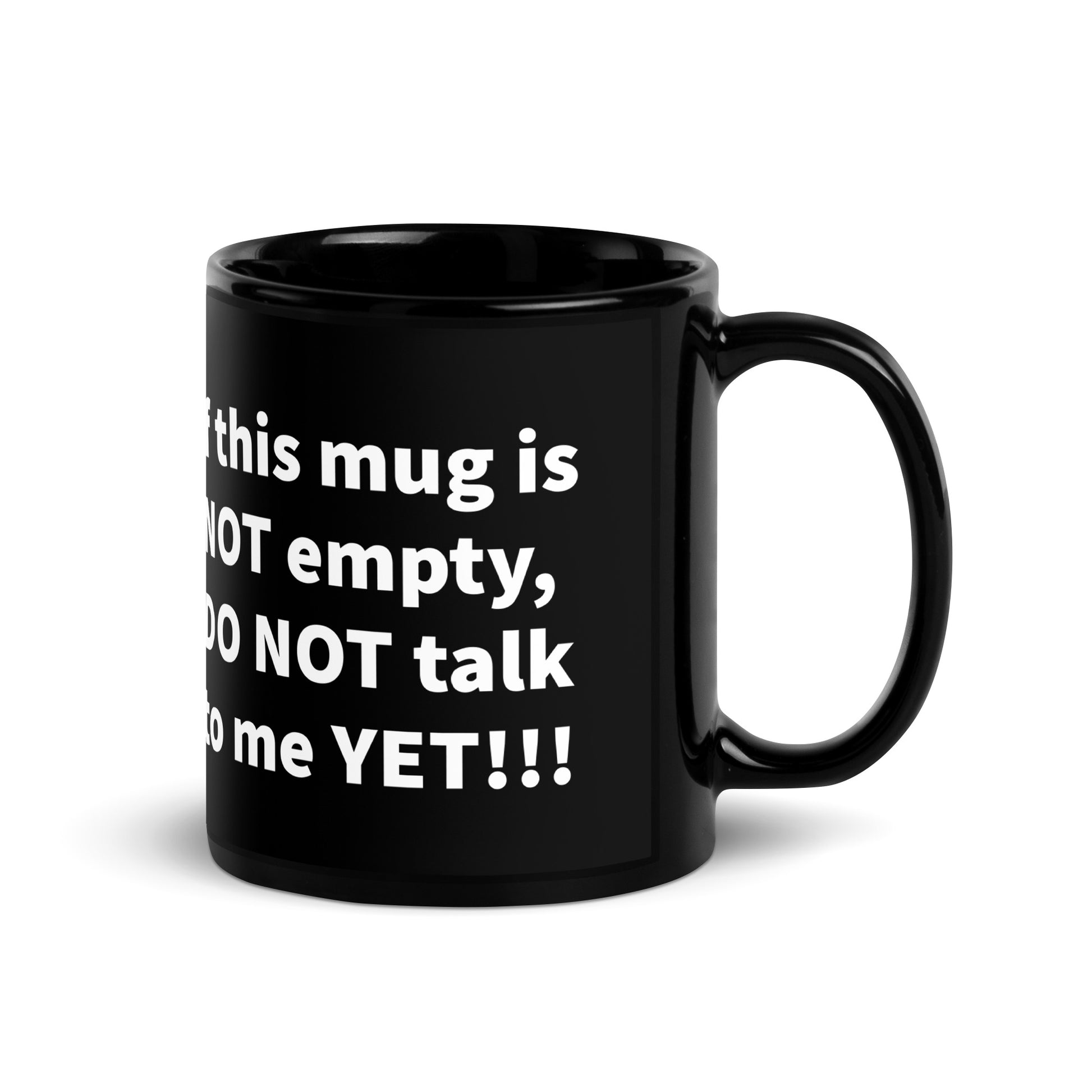 Right view of a black mug with partial view of white text saying 'If this mug is empty, do not talk to me yet!!!'