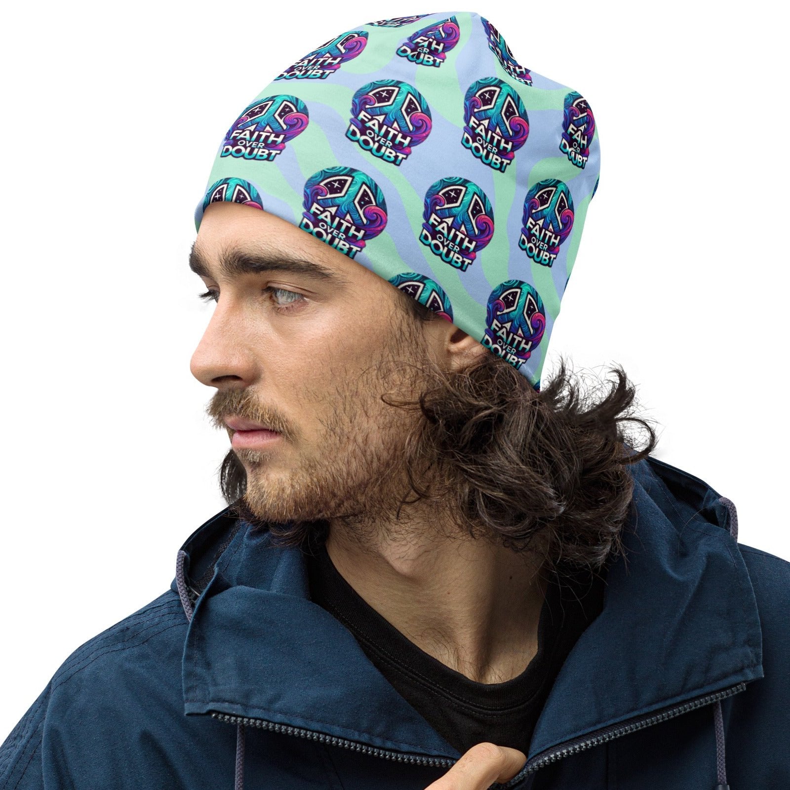 Left front of blue patterned beanie with saying 'Faith over doubt'