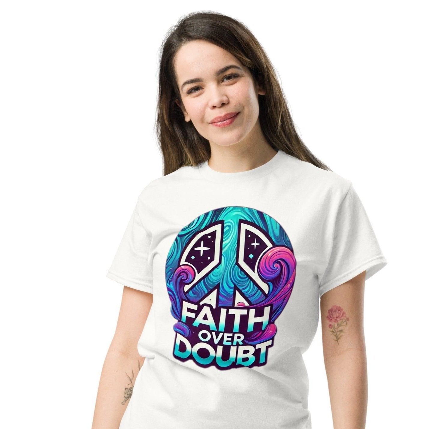 Front of white t-shirt with blue, pink and purple image of peace sign and text saying 'faith over doubt'