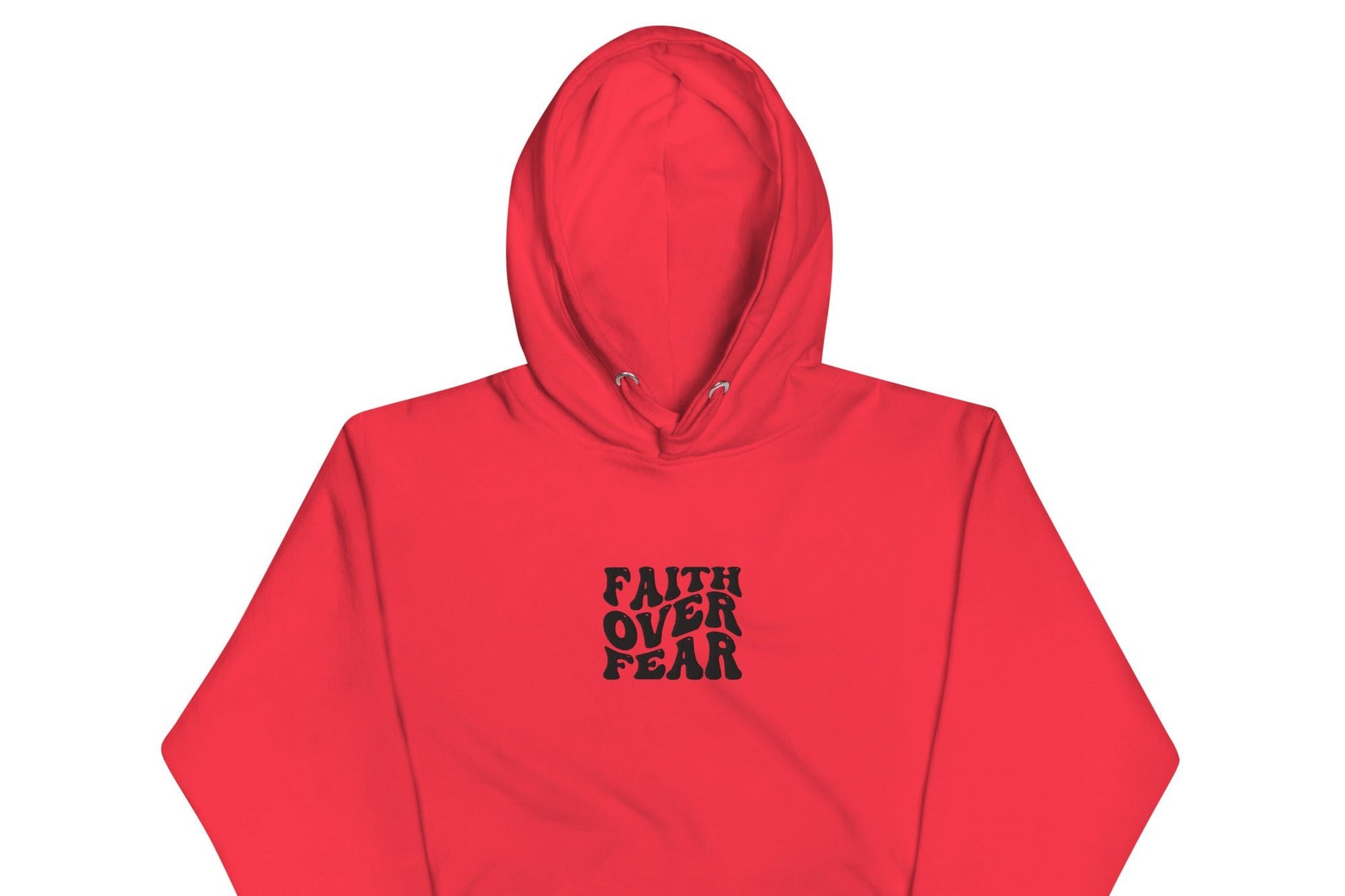 Front of red hoodie with black text saying 'Faith over fear'