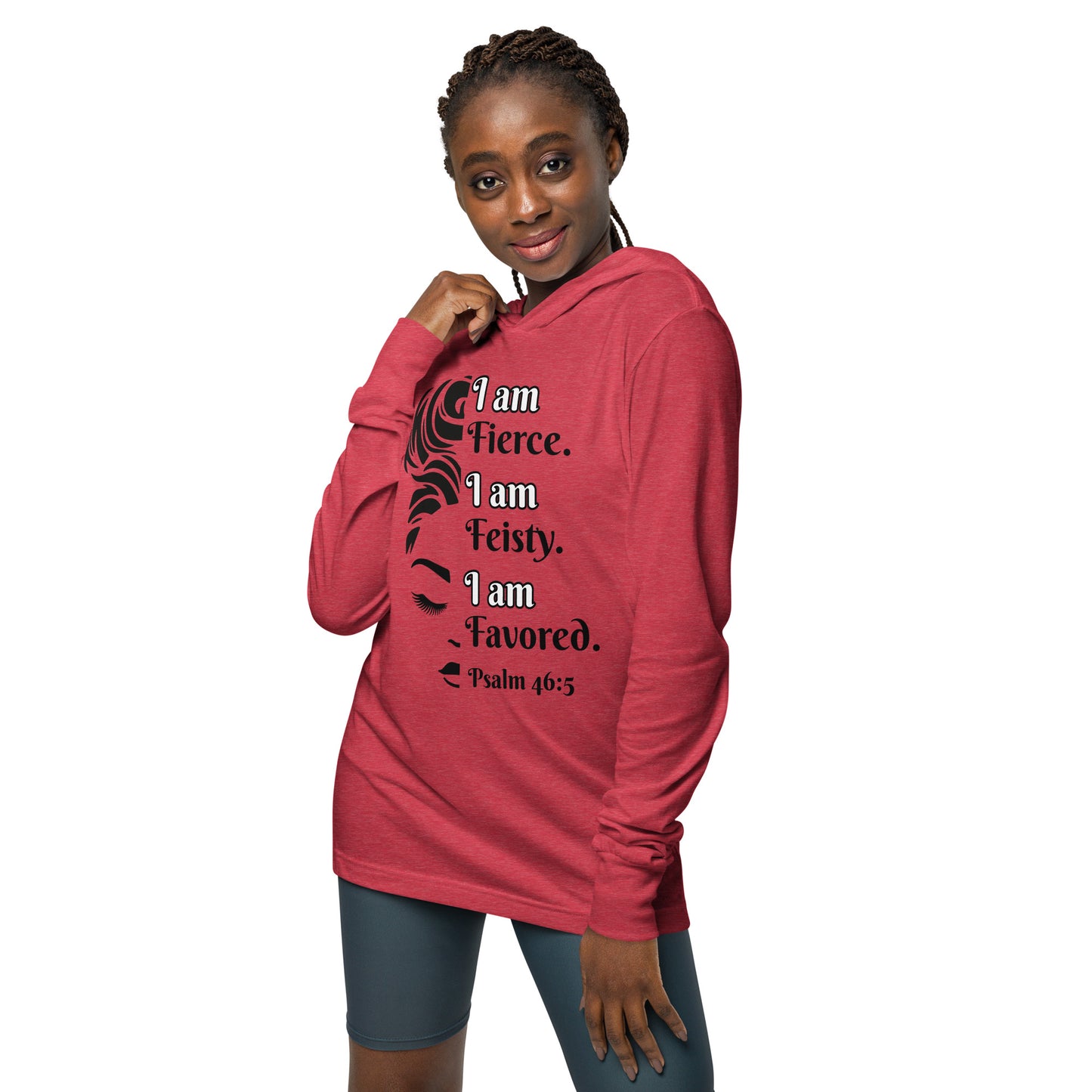 Front of red hooded long sleeve tee with black image of 1/2 woman face and black and white text saying 'I am fierce. I am feisty. I am favored. Psalm 46:5'