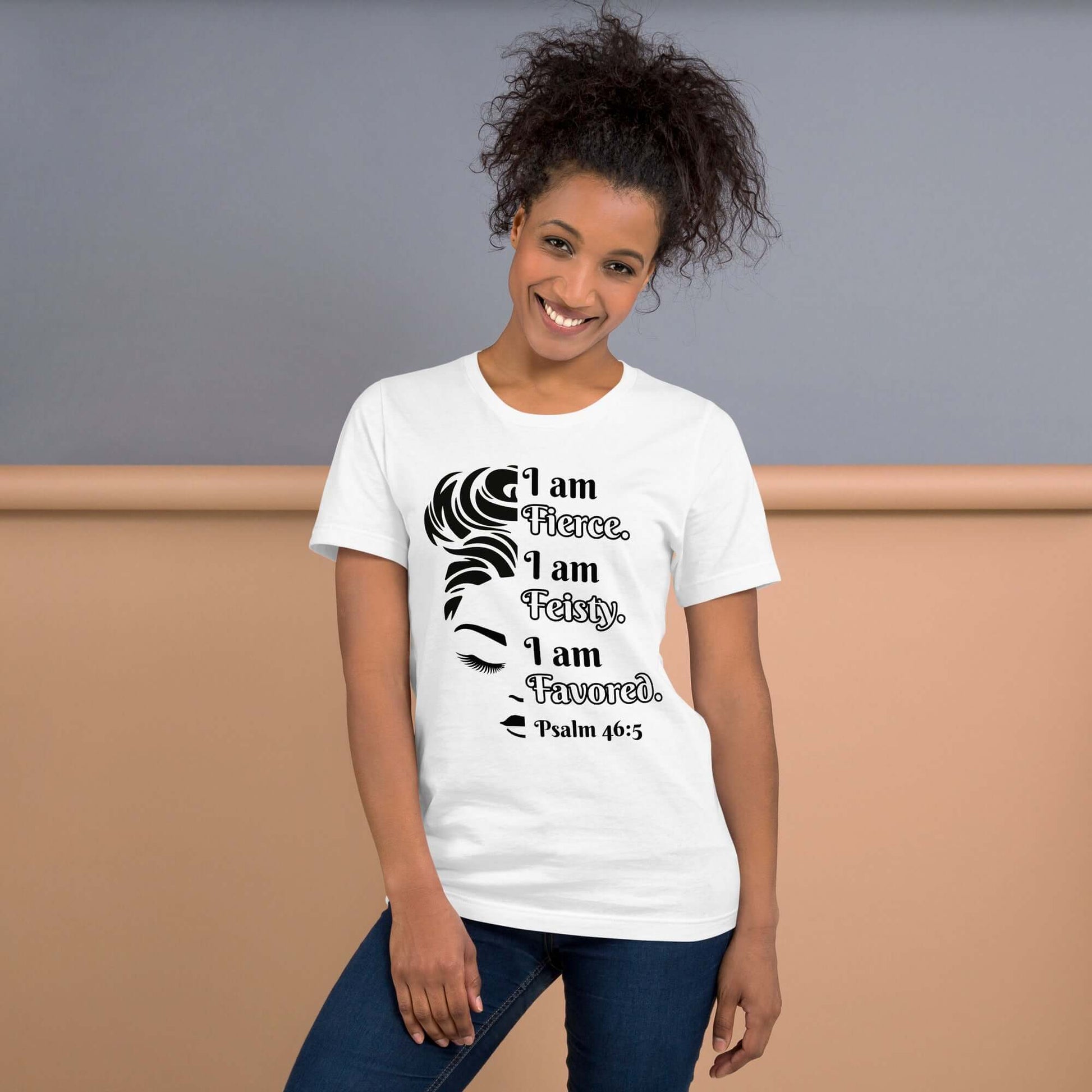 Front of white t-shirt with image of half woman's face with black and white text saying "I am fierce, I am feisty, I am favored and Psalm 46:3'