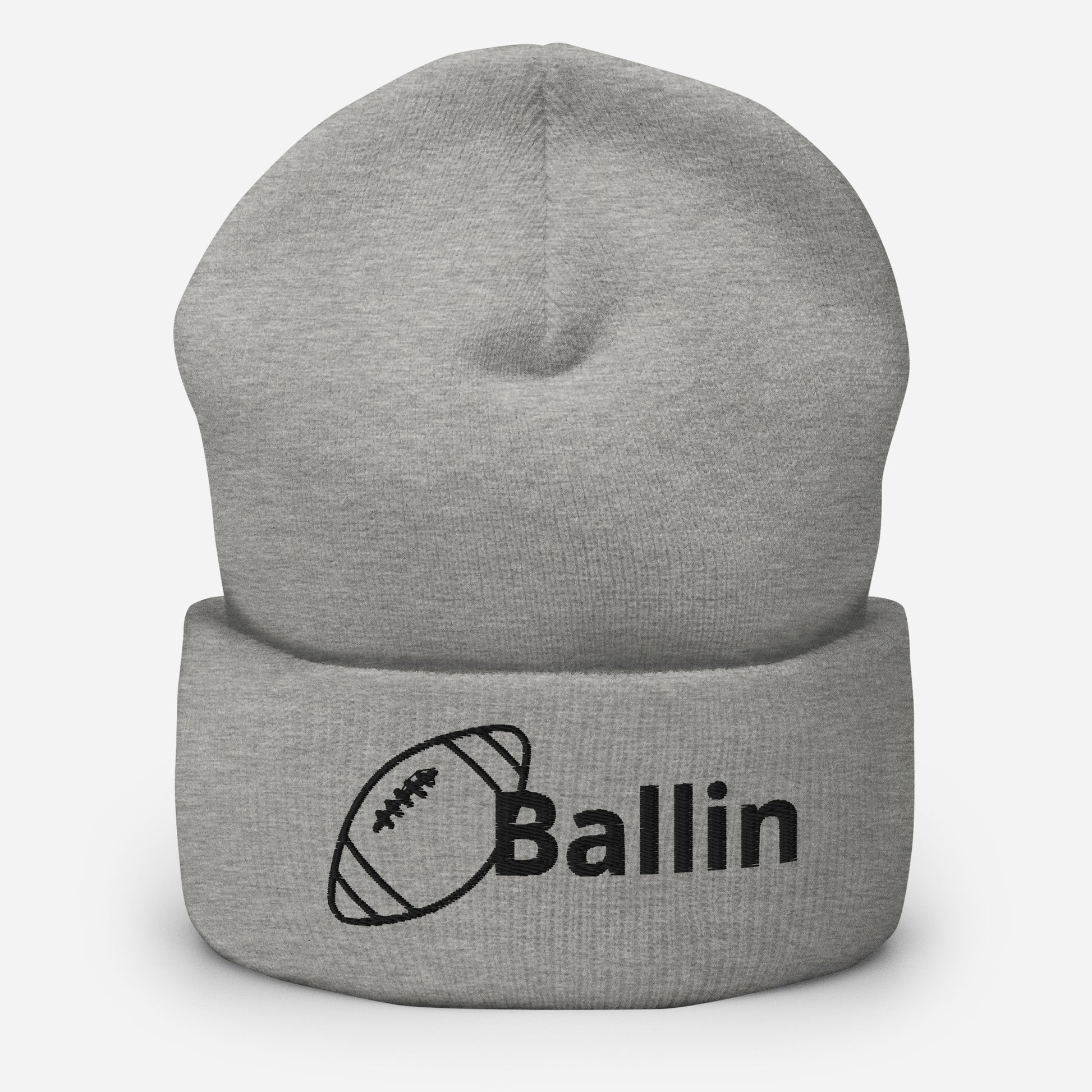 Front of heather grey cuffed beanie embroidered with a black football and black text saying 'ballin'