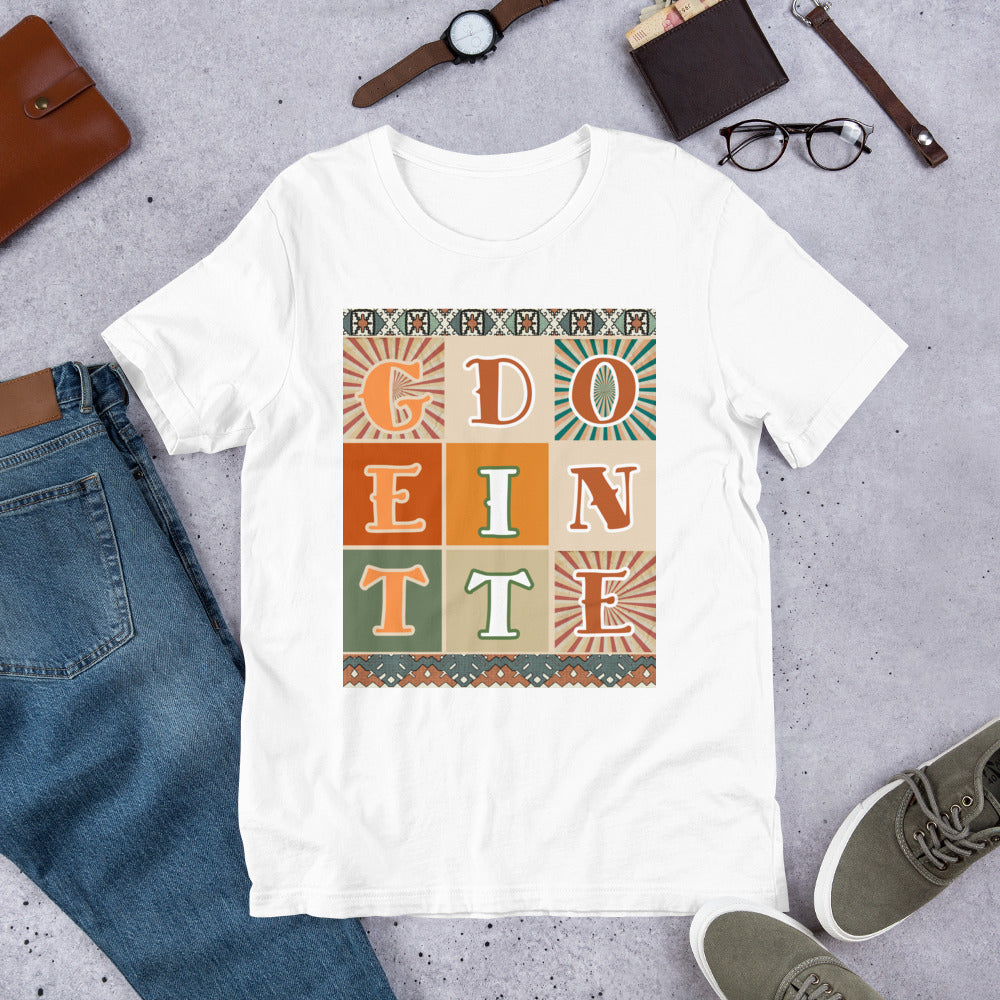 Front of white t-shirt with nine-green, orange and tan square design saying 'Get it done'