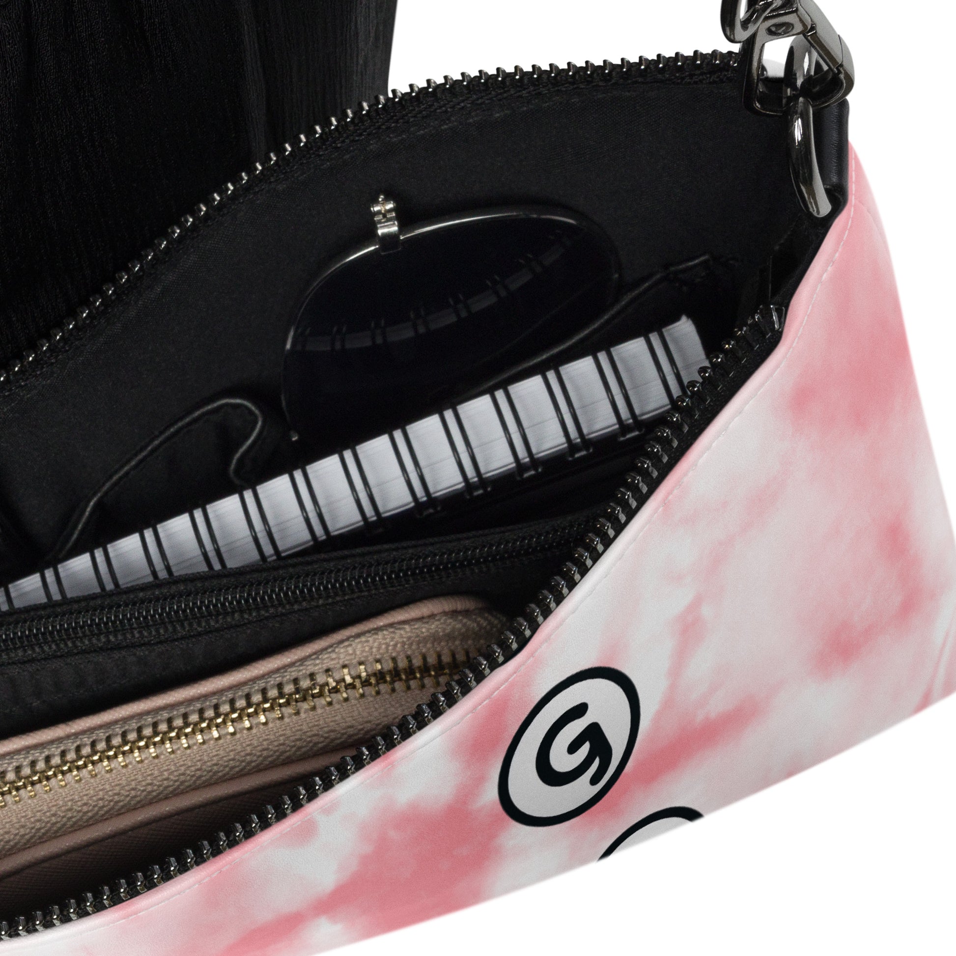 Product detail inside of Girlish crossbody bag with pink and white background with 'G' logo