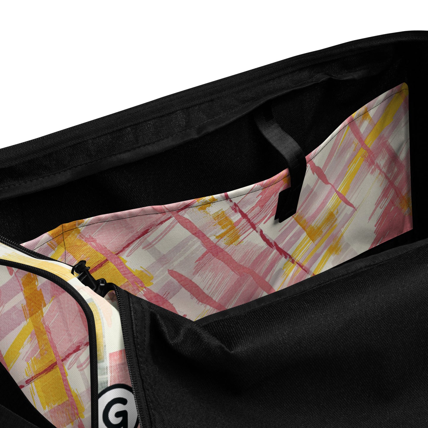 Inside of sherbert print patterned duffel 