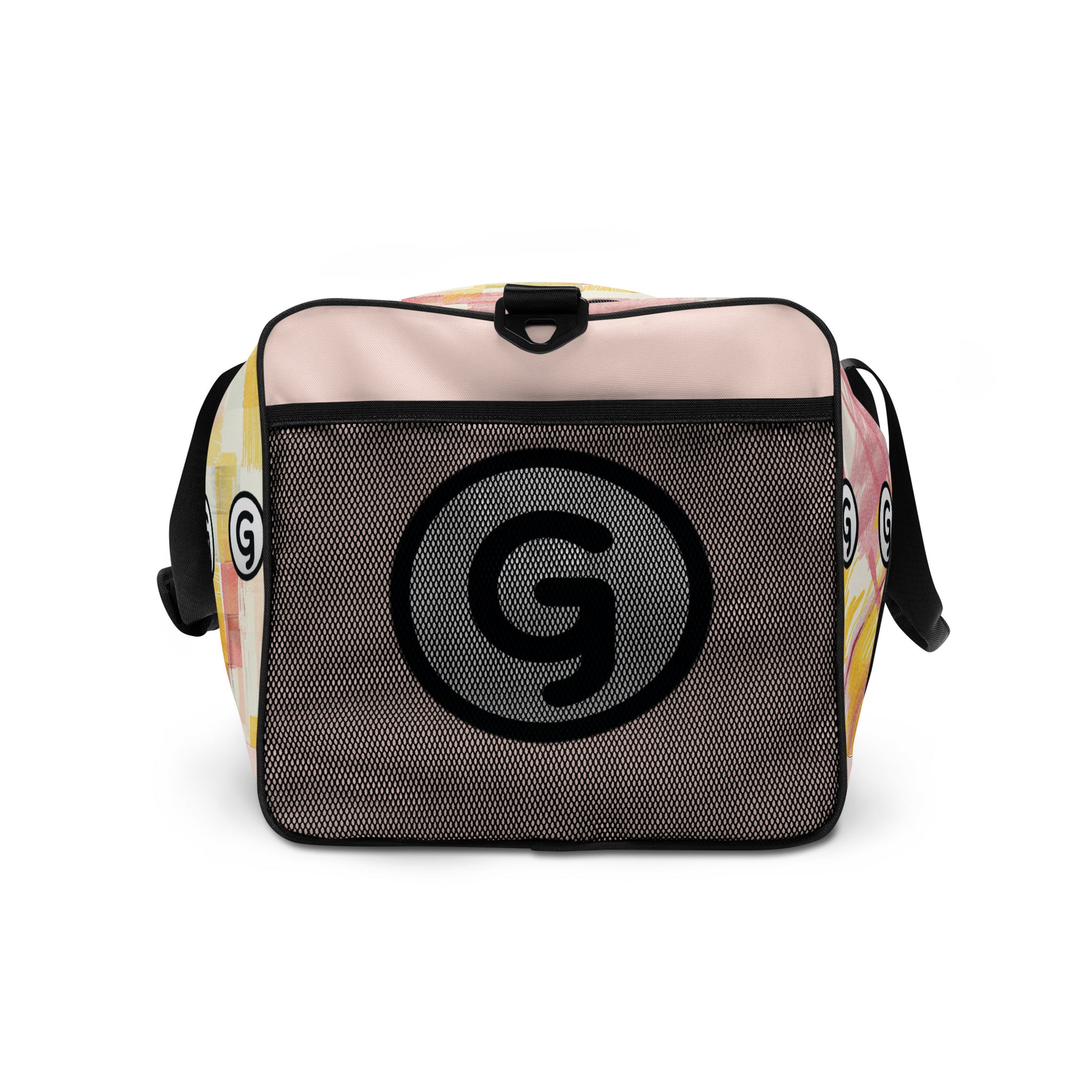Right side of sherbert print patterned duffel back with 'G'