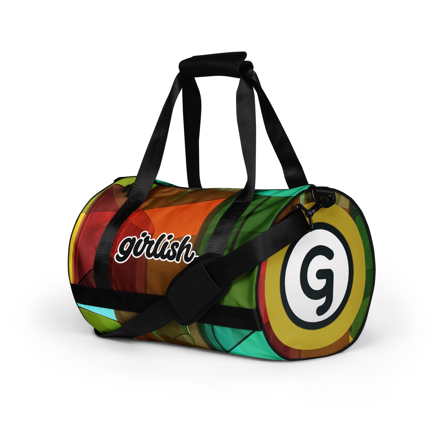 Left front of gym bag with black straps and with a square pattern of brown, red, green, and gold background and 'g" logo on end and word 'girlish' on front