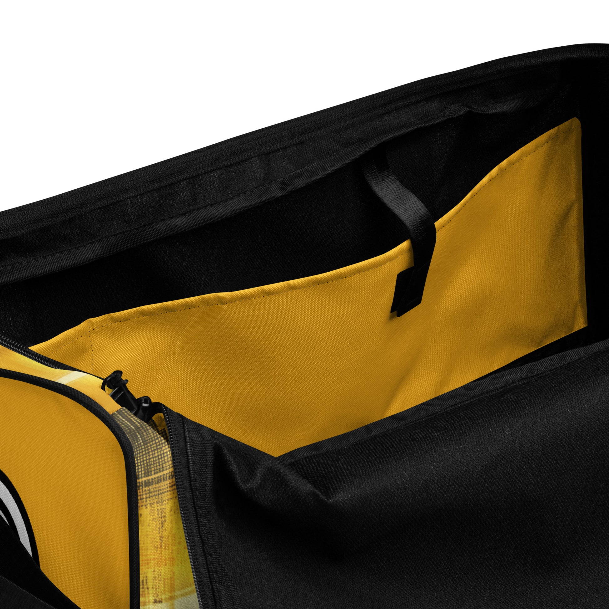 Inside pock of yellow and black duffel
