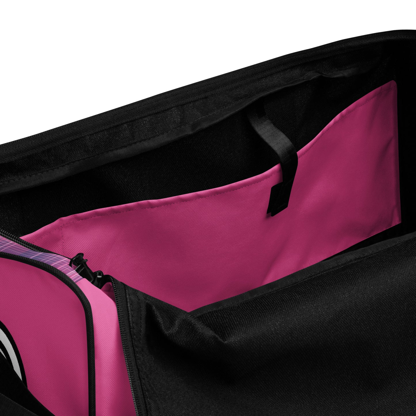 Inside pocket of God's Property duffel bag with fuchsia pocket