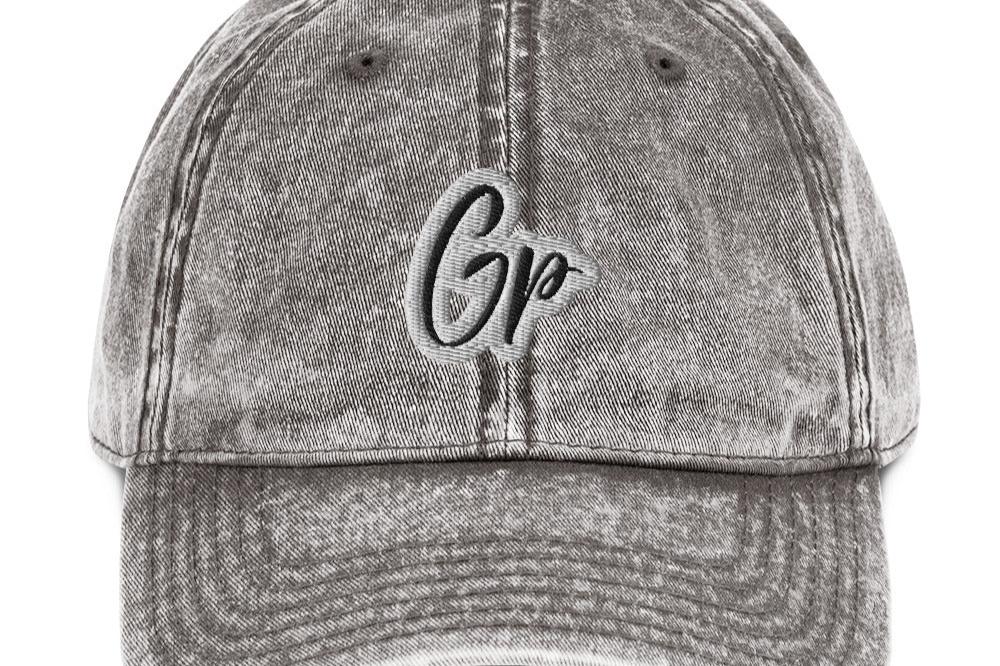 Front of charcoal grey unisex grey twill cap with embroidered of 'GP'