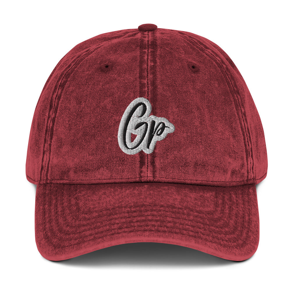 Front of maroon unisex twill cap with embroidered of 'GP'