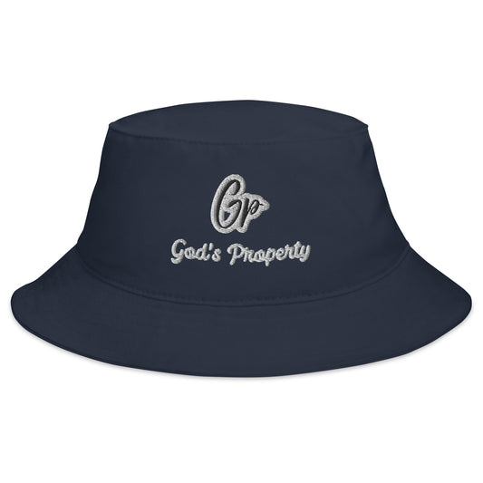 Front of navy embroidered hat with black and gray text saying 'GP, God's property'